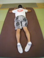 首の凝り　背中の凝り