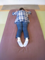 真っ直ぐ伸びない腰痛